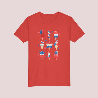 Image: Celebrate summer freedom in style with this red white and blue popsicle shirt for children. Offered in sizes S to XL, this playful tee is perfect for 4th of July and Memorial Day festivities. Whether matched with siblings or worn solo, this patriotic top brings cheer and comfort to any child ready to enjoy a sunny day of celebration, by jaecrece.