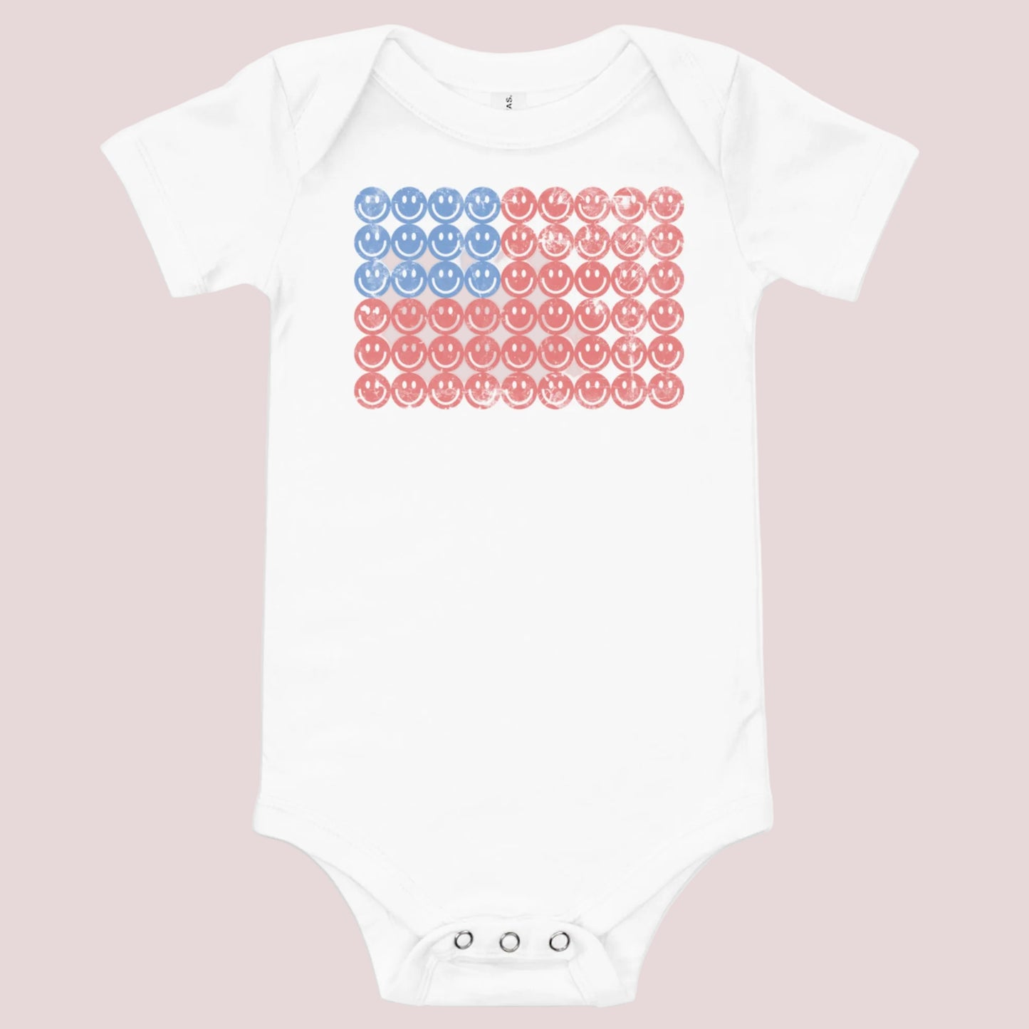 White short sleeve baby onesie with a playful retro American flag design made of smiley faces in red and blue tones. Designed for patriotic baby outfits, 4th of July celebrations, and summer holiday photos. Soft breathable cotton makes it perfect for newborns and infants. Great gift for baby showers, Independence Day outfits, and America 250 themed patriotic family matching.
