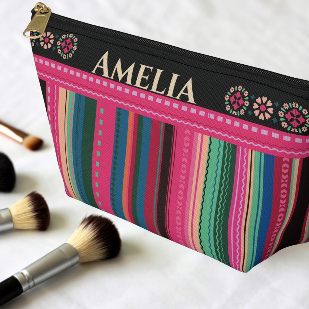 Personalized colorful makeup bag with a serape inspired design and custom name, perfect as a quinceañera gift or quinceañera party favor for a teen girl, with plenty of room for makeup, skincare, jewelry, hair accessories and other personal essentials