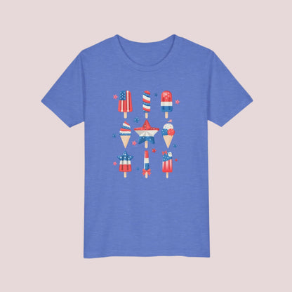 Image: Your child will shine bright in this stars and stripes popsicle shirt, made for kids in sizes S to XL. The red white and blue design celebrates all things American, making it a must have for patriotic holidays. Great for summer adventures, this fun tee is soft and breathable, ideal for family barbecues, flag waving, and firework watching, by jaecrece.