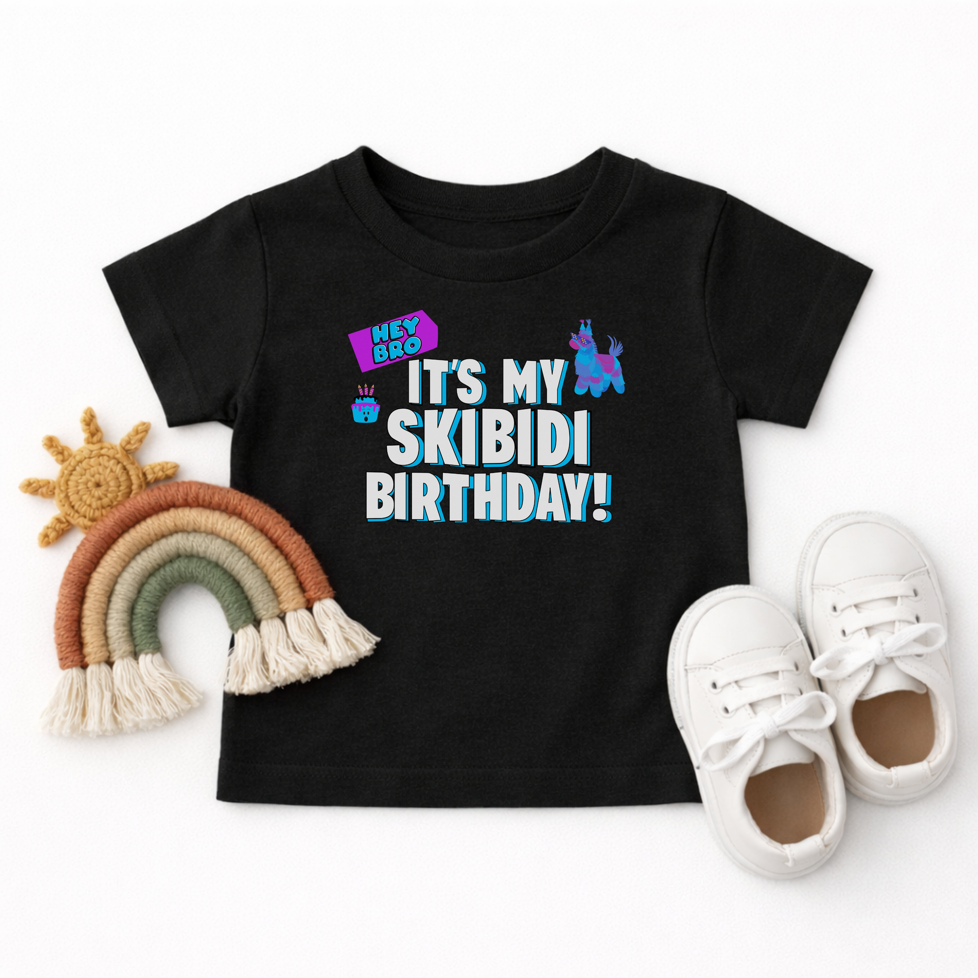 Toddler birthday outfit featuring a funny Skibidi graphic tee with bold blue and white lettering, colorful birthday graphics, and playful internet humor designed for a memorable birthday celebration