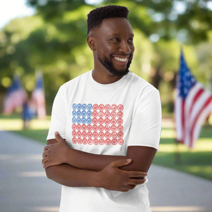 White adult tshirt, featuring a Fourth of July pattern of red and blue smiley faces which form an American flag. by jaecrece.com