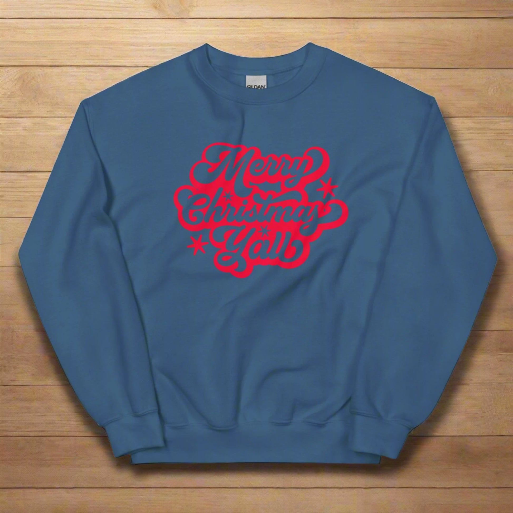 Merry Christmas Y'all Unisex Holiday Adult Sweatshirt, featuring large cursive script with reads Merry Christmas Y'all in red lettering. The perfect Southern Christmas gift or present, extended/ plus size available. by jaecrece