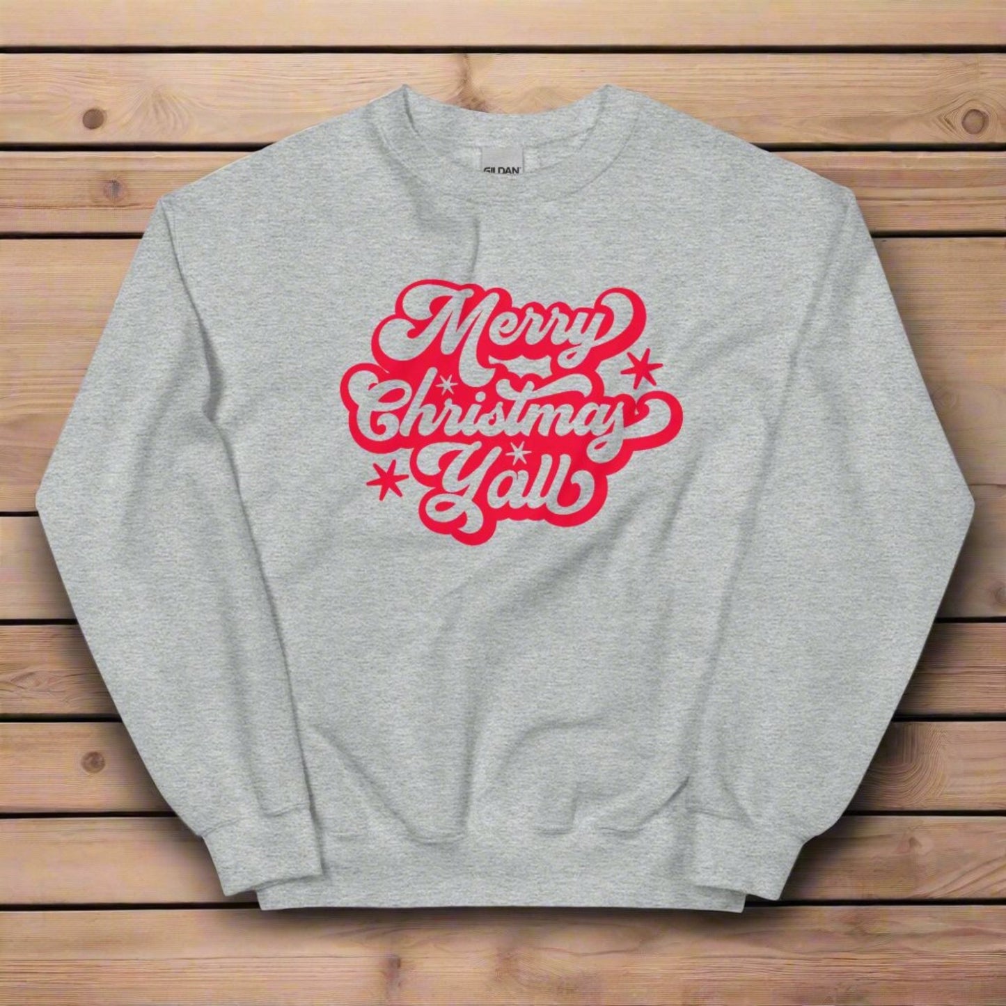 Merry Christmas Y'all Unisex Holiday Adult Sweatshirt, featuring large cursive script with reads Merry Christmas Y'all in red lettering. The perfect Southern Christmas gift or present, extended/ plus size available. by jaecrece