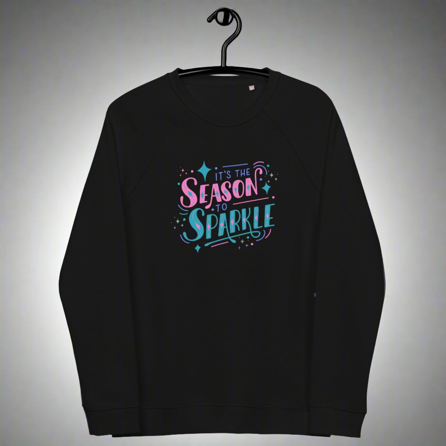 100% organic cotton sweatshirt that reads "it's the season to sparkle" in pink and teal lettering, by jaecrece.com