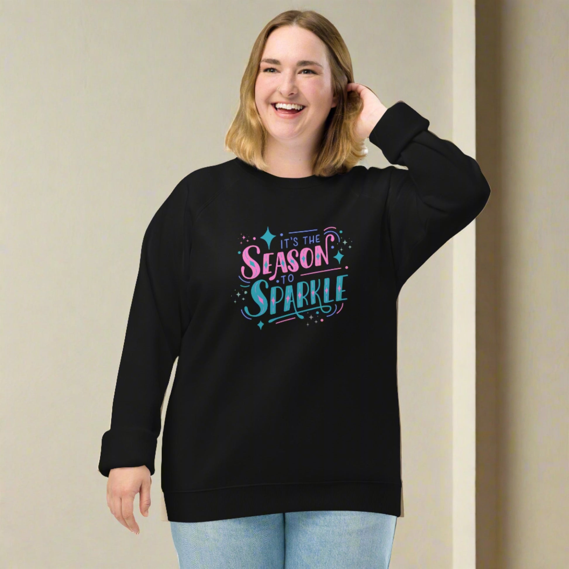 100% organic cotton sweatshirt that reads "it's the season to sparkle" in pink and teal lettering, by jaecrece.com