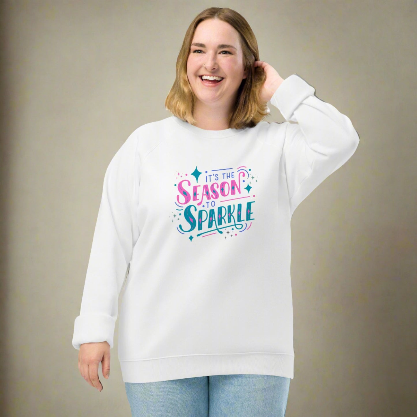 100% organic cotton sweatshirt that reads "it's the season to sparkle" in pink and teal lettering. Extended/ plus size available. By jaecrece.com