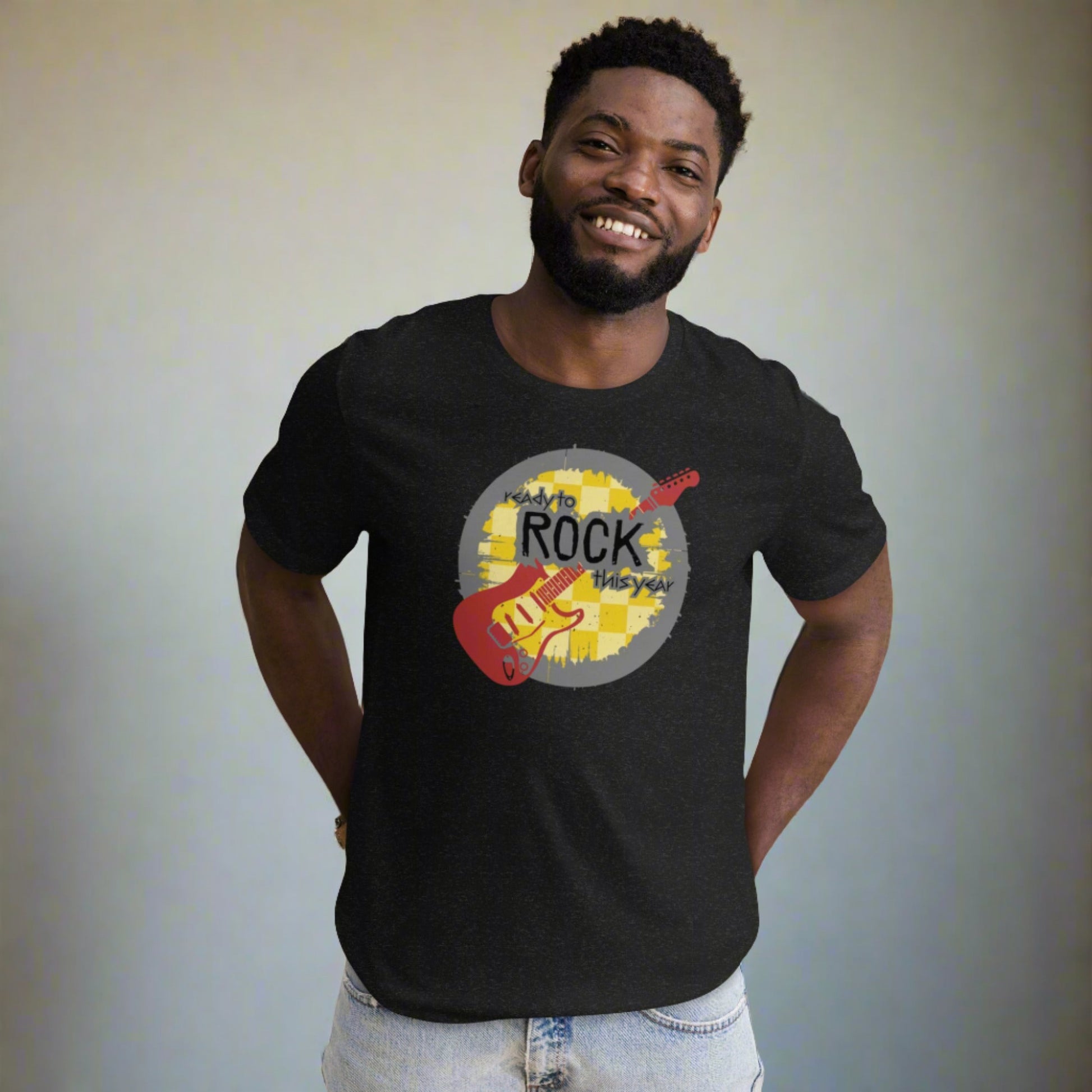 Black adult tshirt, with a mustard yellow checkerboard background. Maroon guitar. The rock and roll font reads "Ready to rock this year", by jaecrece.com