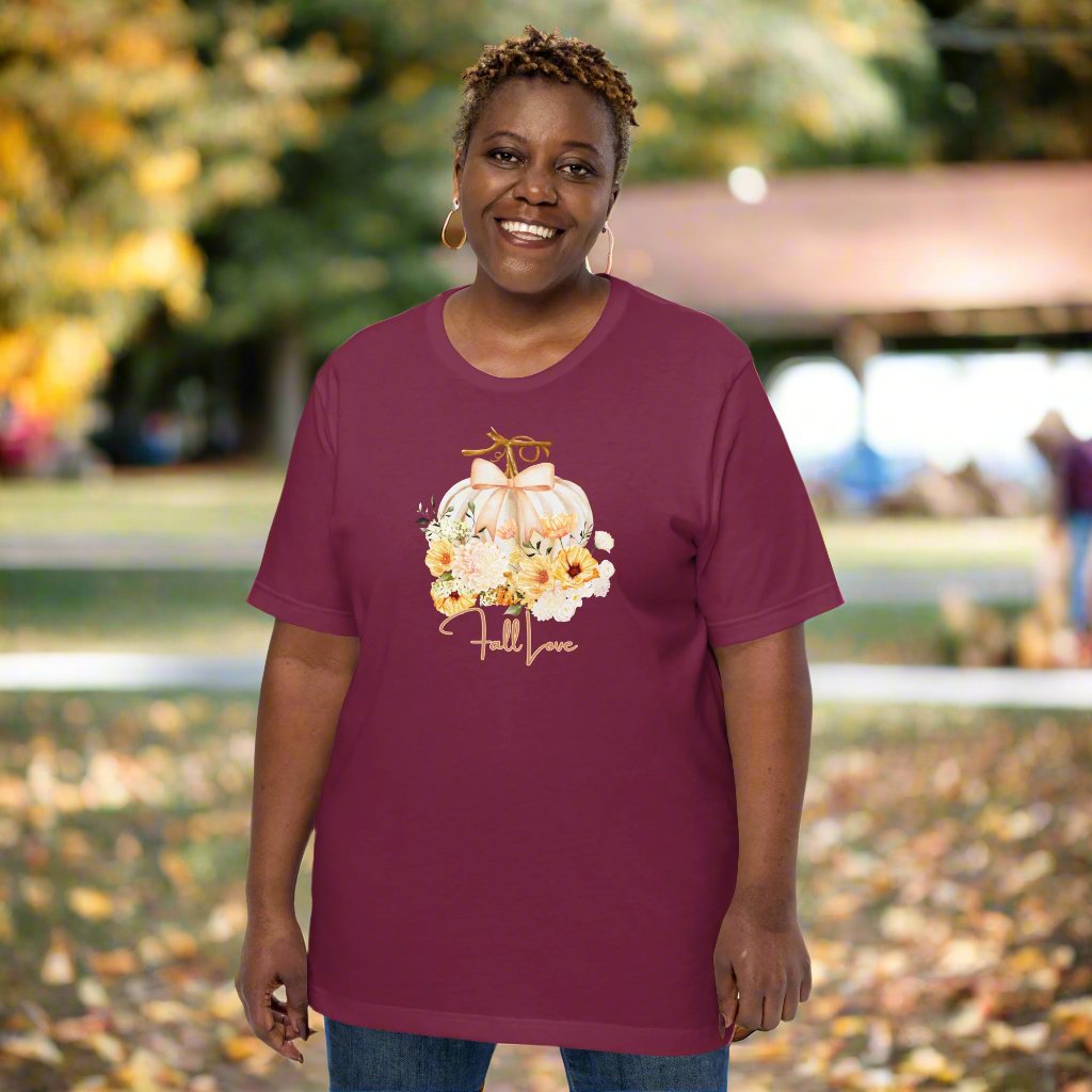 Fall Love Tshirt, featuring a white pumpkin with a peach ribbon, surrounded by fall flowers. The text reads fall, love, by jaecrece.