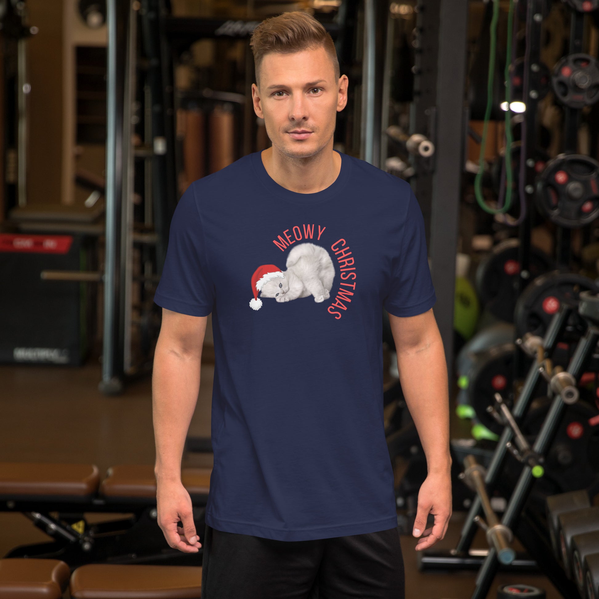 Celebrate the holidays with cozy vibes and silly puns in this Meowy Christmas adult t-shirt. The design shows a grey kitten with blue eyes wearing a Santa hat and the phrase “Meowy Christmas” across the front. Soft and lightweight, this tee comes in sizes XS–5XL and matches with kids’ sizes and even a coordinating sweatshirt and blanket. A fun, festive gift idea for cat lovers and holiday party goers.