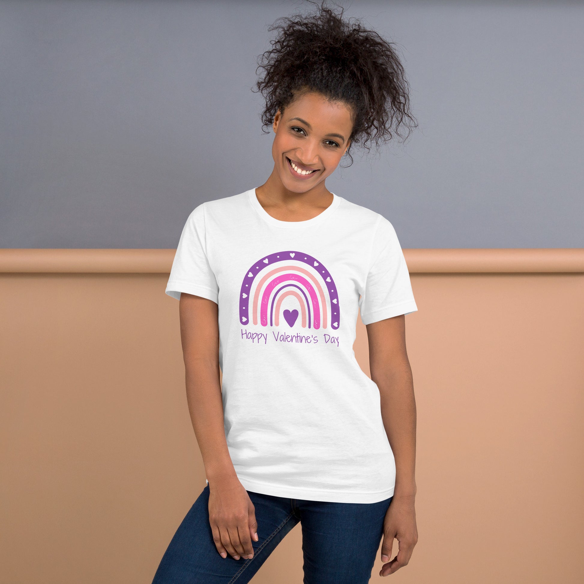 Image: Hearts and Rainbows Mommy and Me Happy Valentines Shirt in pink, white and black. This short sleeved shirt features a boho aesthetic rainbow in pinks and purples with hearts. The text reads Happy Valentines Day, by jaecrece