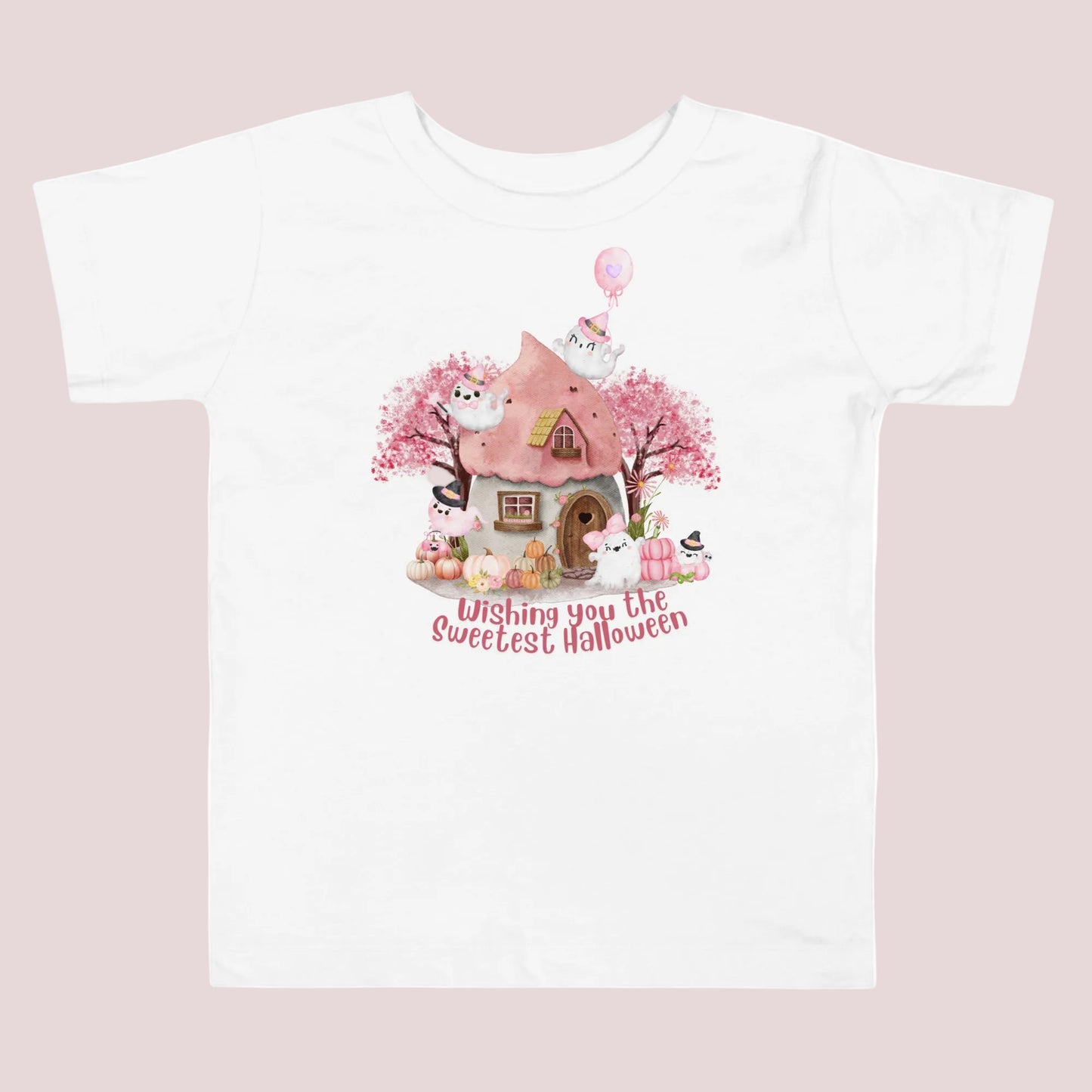 Adorable watercolor inspired Halloween scene for toddlers featuring several friendly white ghosts, pink pumpkins, flowers, autumn trees, and a cozy haunted cottage. Soft pink colors and playful details create a sweet Halloween aesthetic for parties, pumpkin patches, and trick or treating.