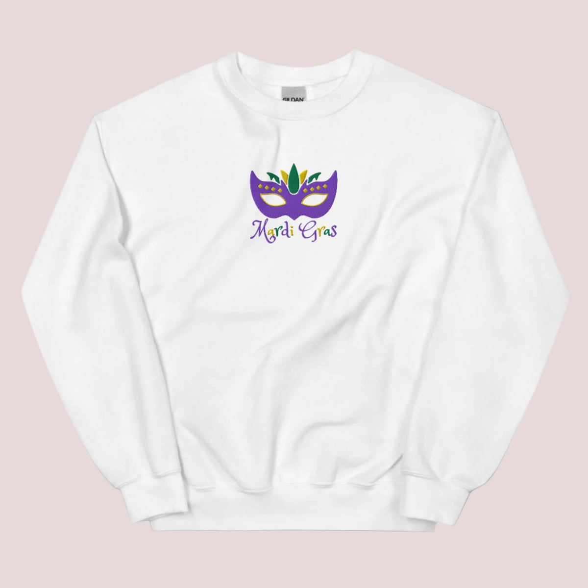 This embroidered Mardi Gras adult sweatshirt in sizes S–5XL is made for Carnival lovers and New Orleans dreamers. With a vibrant purple, green, and gold mask and “Mardi Gras” stitched on the front, it’s the ultimate French Quarter fashion piece. Wear it at parades, parties, or lounging in festive comfort while celebrating Louisiana’s iconic holiday.

