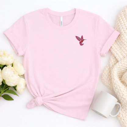 Women's embroidered hummingbird shirt with a bright pink bird design on the left chest, a simple nature lover tee available in multiple colors and sizes XS through 5XL, perfect for gardening, bird watching, botanical outings and everyday wear