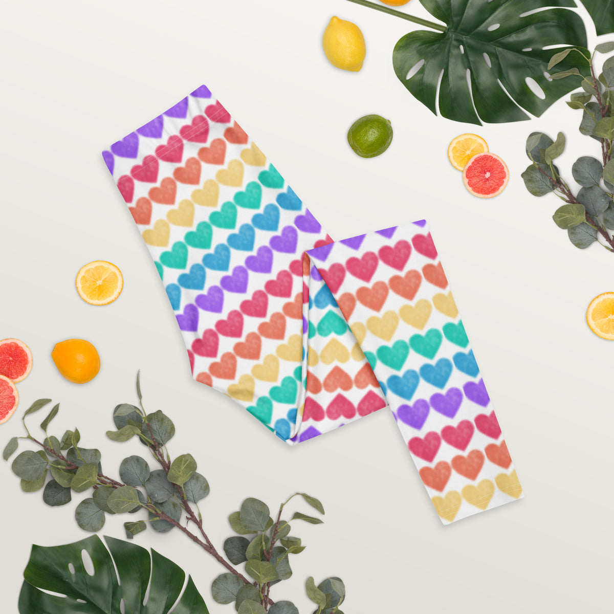 Turn heads in these Women’s Rainbow Hearts Leggings—full-length, mid-rise leggings featuring heart patterns in vivid rainbow hues. Whether you're heading to a Pride parade, yoga class, or weekend brunch, these leggings deliver comfort and color. They stretch with you and never lose shape. Available in toddler and child sizes for matching family looks with attitude.