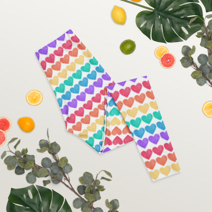 Turn heads in these Women’s Rainbow Hearts Leggings—full-length, mid-rise leggings featuring heart patterns in vivid rainbow hues. Whether you're heading to a Pride parade, yoga class, or weekend brunch, these leggings deliver comfort and color. They stretch with you and never lose shape. Available in toddler and child sizes for matching family looks with attitude.