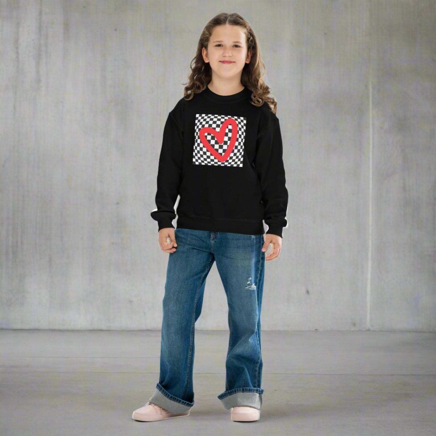 Checkerboard Love Youth Sweatshirt, features a retro black and checker optical illusion pattern with a red heart. Perfect as a gift for Valentine's Day! Matching shirts, baby bodysuits available in baby, child and adult sizes, by jaecrece