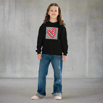 Checkerboard Love Youth Sweatshirt, features a retro black and checker optical illusion pattern with a red heart. Perfect as a gift for Valentine's Day! Matching shirts, baby bodysuits available in baby, child and adult sizes, by jaecrece
