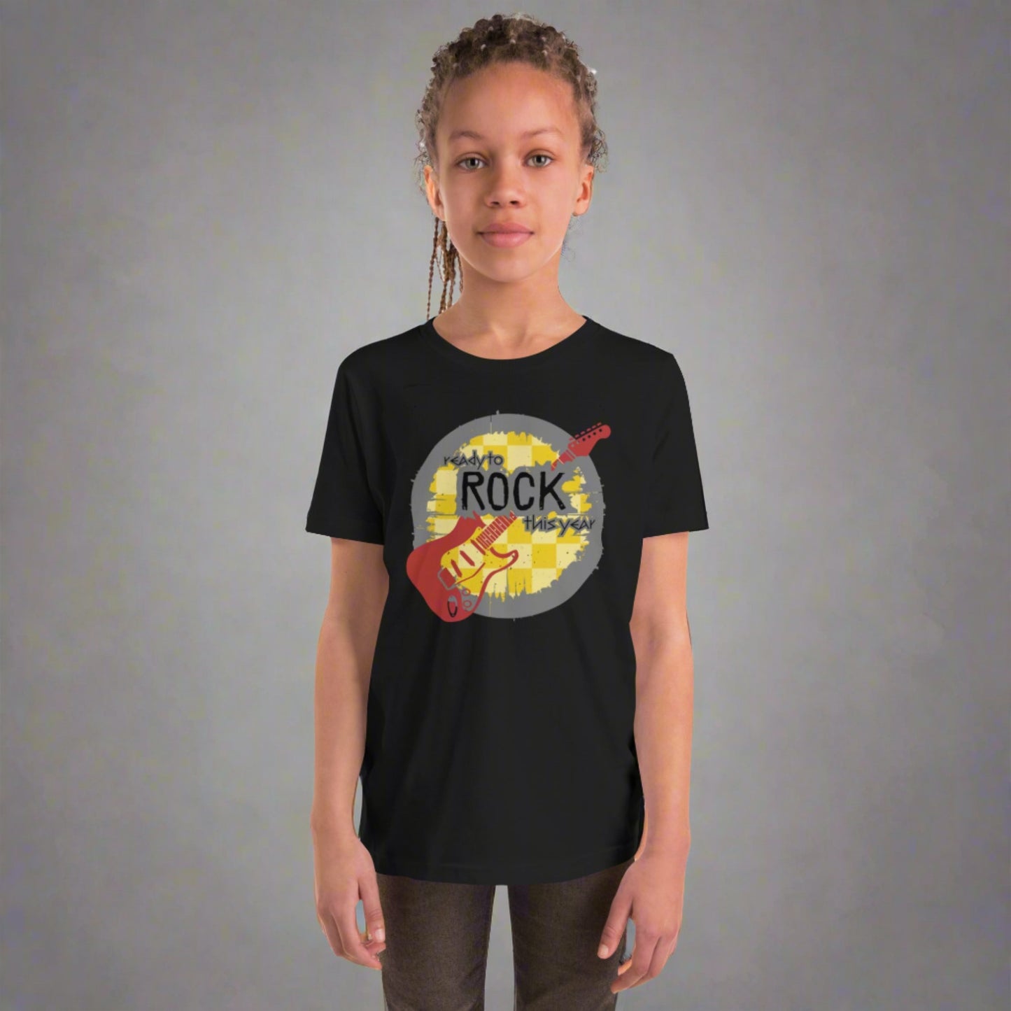 Black youth unisex tshirt, with a mustard yellow checkerboard background. Maroon guitar. The rock and roll font reads "Ready to rock this year", by jaecrece.com