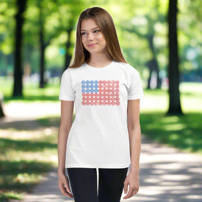 White unisex patriotic shirt for boys and girls. The graphic is an American flag, made up of Blue and Red Vintage smiley faces, by jaecrece.com