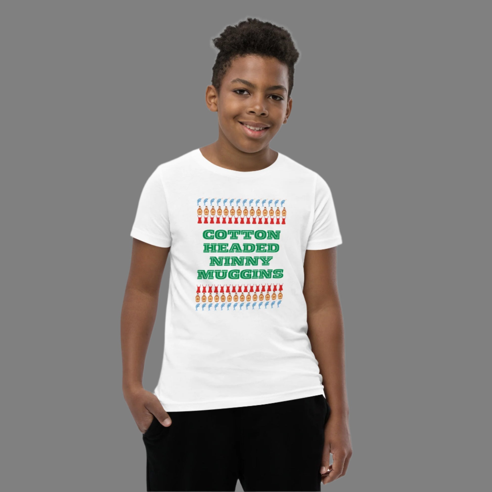 “Cotton Headed Ninny Muggins” youth tee in soft cotton fabric, designed for comfort and holiday fun. This short sleeve kids’ Christmas t-shirt is breathable and pre-shrunk for a perfect fit. Ideal for boys and girls attending holiday parties, Elf movie marathons, or Christmas family photos. Makes a playful and cozy gift for little ones who love festive humor.
